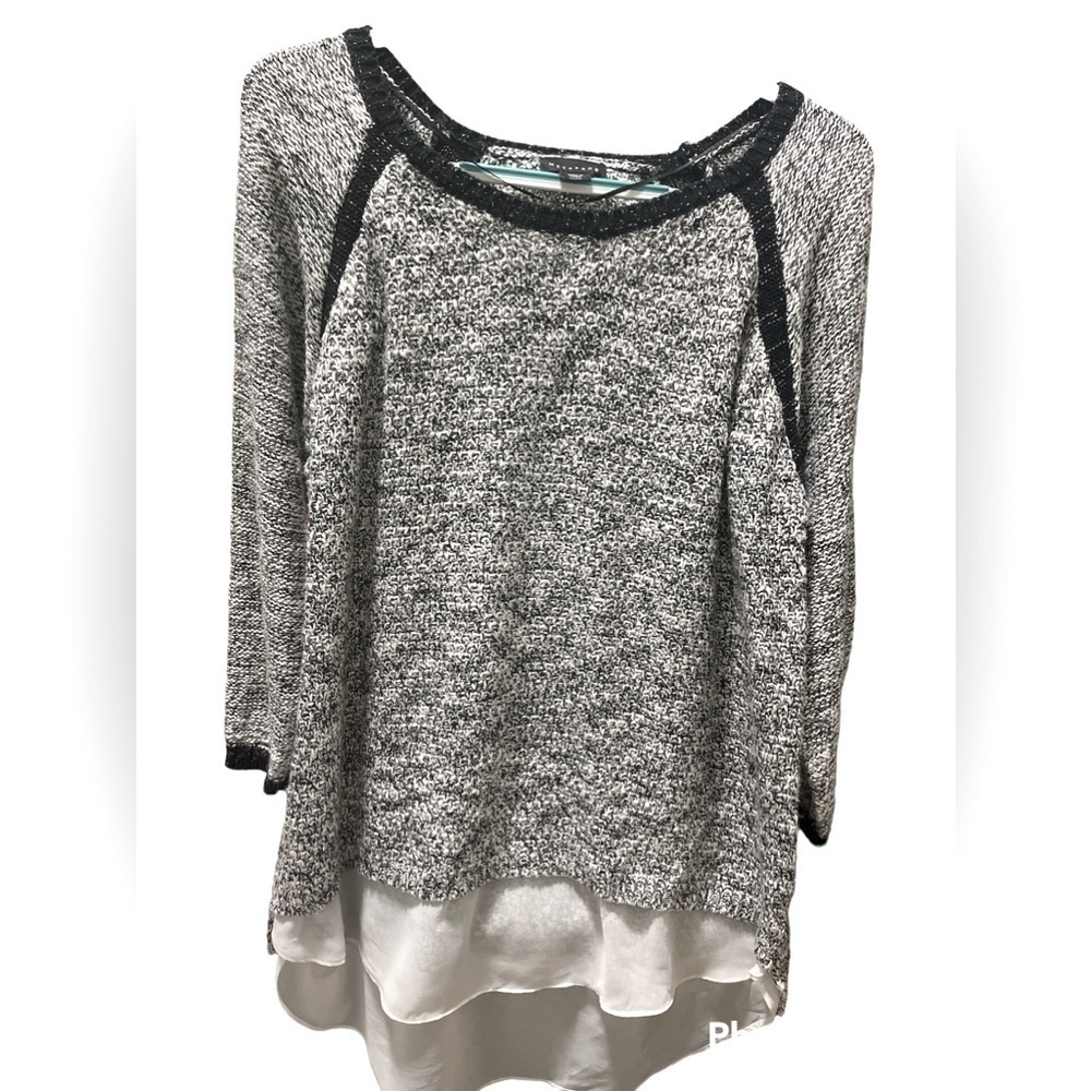 Black and white layered long sleeve sweater with a touch of sparkle.